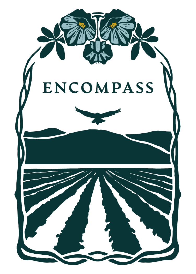 Logo of 'Encompass' with nature-themed design elements on a transparent background